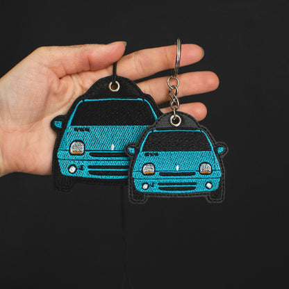 Zdjęcia haftowanego breloka i zawieszki EnczArts niebieski Renault Twingo 1